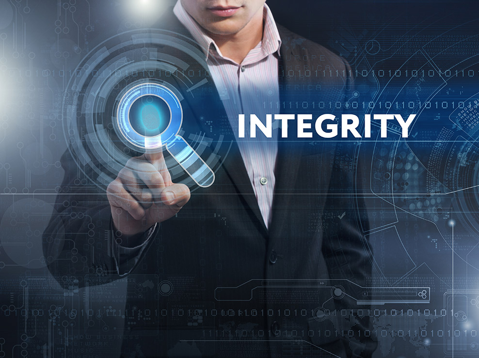 Person pushing Integrity icon on computer screen