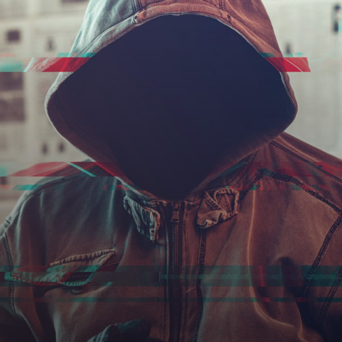 A hooded figure with graphic lines covering the image.